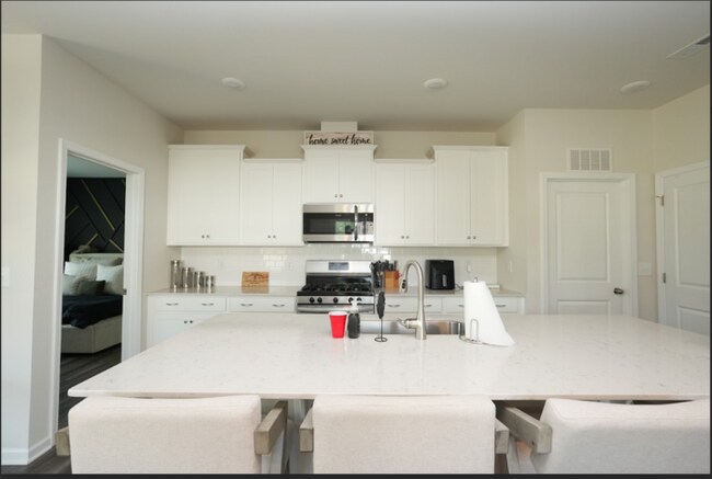 Building Photo - Spacious 4-Bedroom Home with Modern Comforts