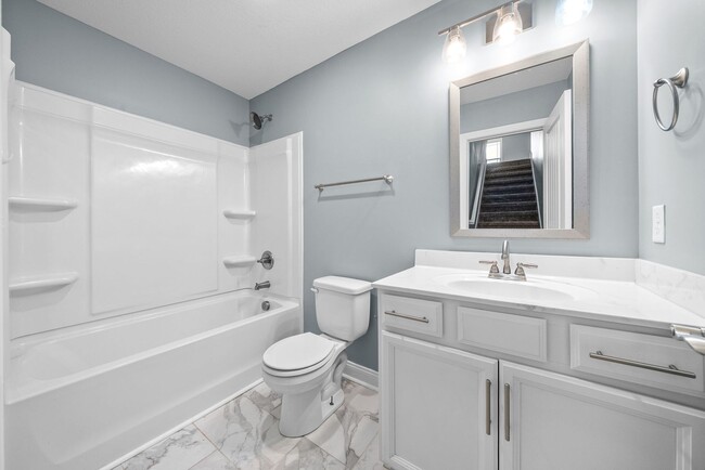 Building Photo - Pet Friendly Three Bedroom with Bonus!