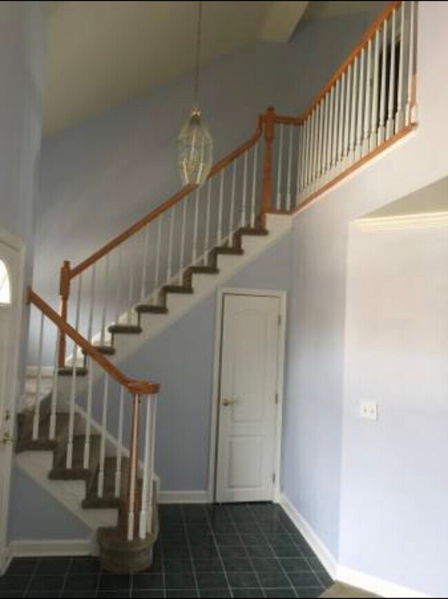 Stairway to upper floor - 6916 Fairfax Dr