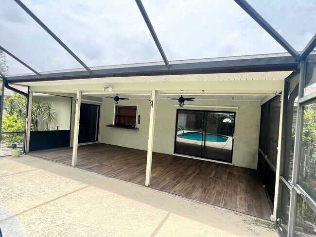 Building Photo - BEAUTIFUL 3 BEDROOM POOL HOME IN SANDPIPER...