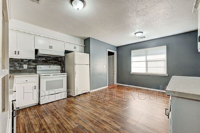 Building Photo - 8616 N Harvey Ave