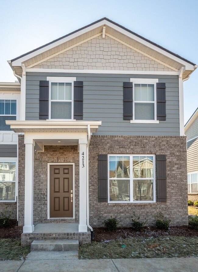 Building Photo - **BE THE LUCKY ONE TO LIVE IN THIS 2022-BUILT END-UNIT TOWNHOME IN BLACKMAN STATION**