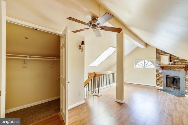 Large closet, fireplace and ceiling fan. - 1415 E Abingdon Dr