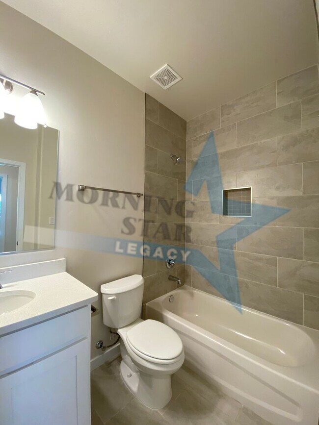 Building Photo - NEW CONSTRUCTION AND FULLY LOADED