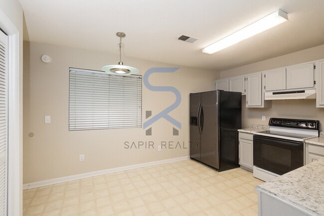 Building Photo - Move in before December 15th and choose your reward: a $250 Amazon Gift Card or a 55" Smart TV!