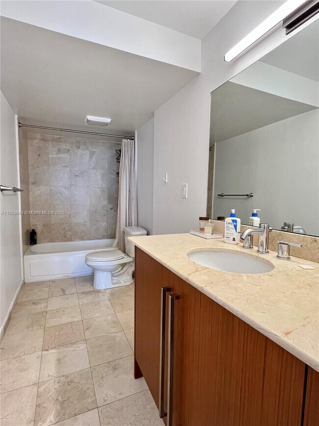 Building Photo - 10275 Collins Ave