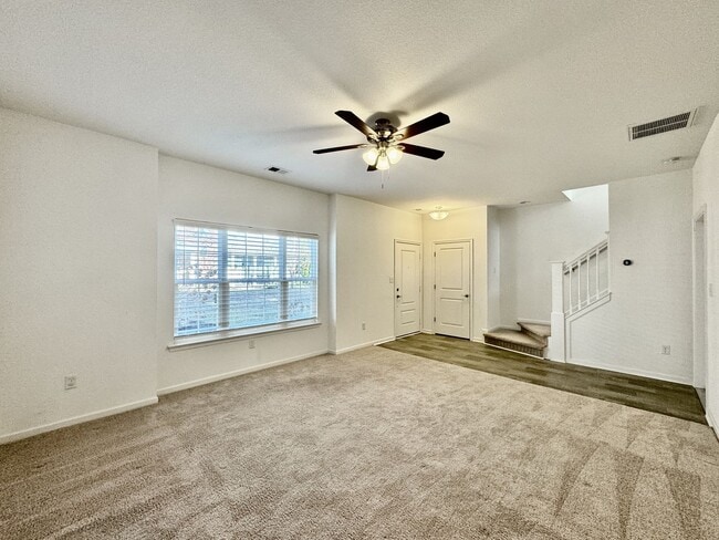 Building Photo - 3 Bedroom Townhome in Spence Crossing! Water/Sewer/Trash/Landscaping INCLUDED! - Attached Garage ...