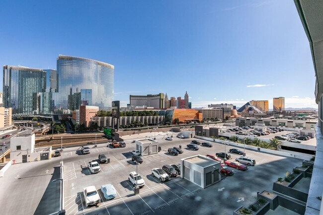 Building Photo - Iconic Strip-View Luxury | Elegant 1BR + Den High-Rise Residence