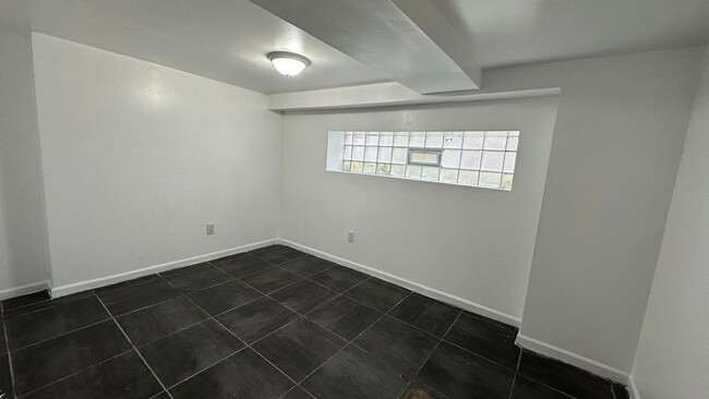 Building Photo - 5830 N Artesian Ave