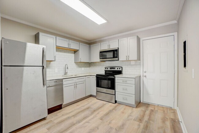 Building Photo - Gorgeously Renovated Apartments