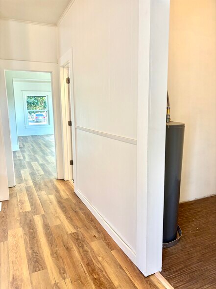 View from back porch, looking into pantry, kitchen, and front/dining room - 601 J Street