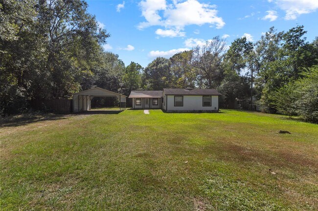 Building Photo - 8206 Sunflower Dr