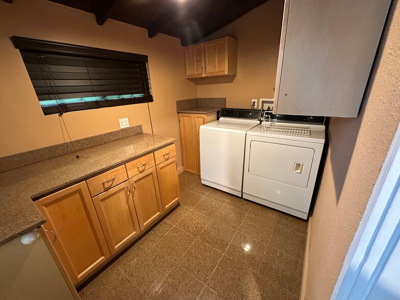 Laundry room washer and dryer - 10809 Huston St