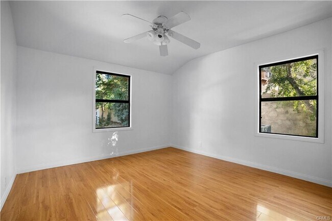 Building Photo - Tucked away behind gorgeous grand gates is this beautifully updated 3 bedroom 2 bath home