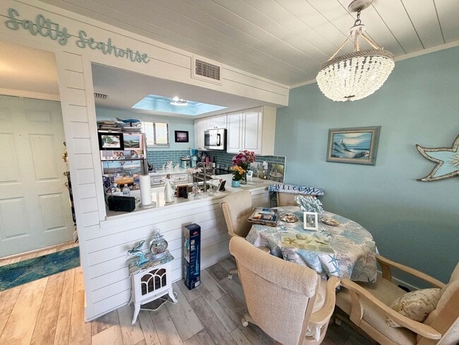 Building Photo - Beautifully Renovated, Fully Furnished Beach Condo just a short walk from the ocean.