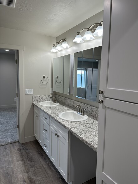 Master bath sink layout with linen cabinet - 187 Courthouse Way