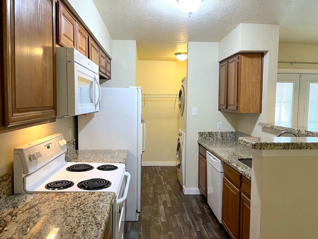 Building Photo - AUG 2026 PRE-LEASE!  Spacious 2 Bedroom Condo