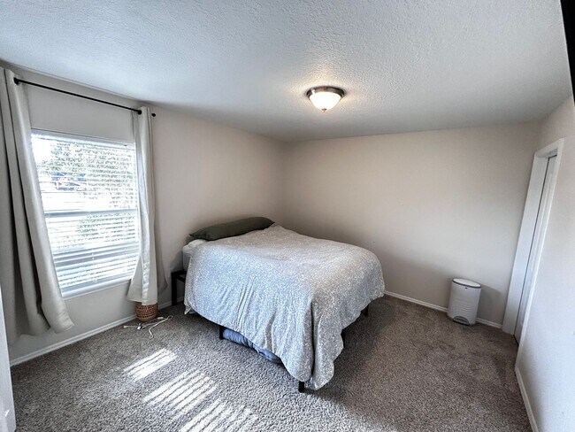 Building Photo - Newer Build 3/2 with Fenced in yard minute...