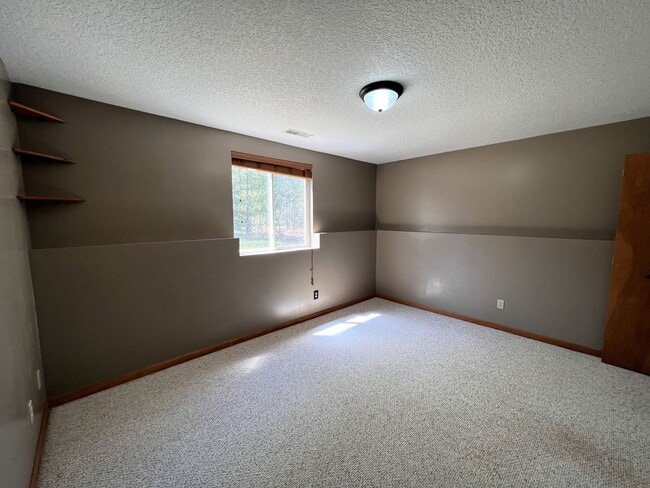 Building Photo - Bright, Spacious, and Surrounded by Nature