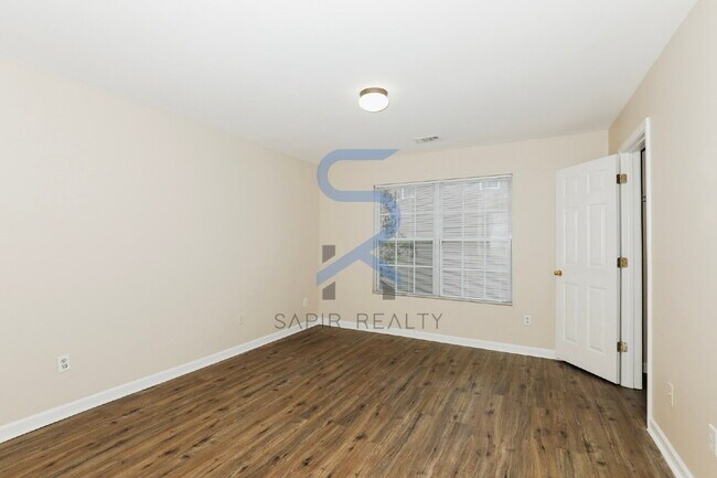 Building Photo - Move in before February 28th and choose your reward: a $250 Amazon Gift Card or a 55" Smart TV!