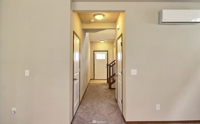 hallway first floor - 596 NE Nantucket St