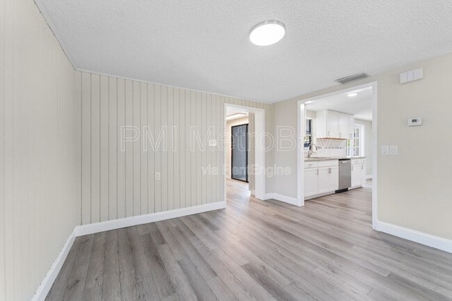 Building Photo - 6121 N Falkenburg Rd