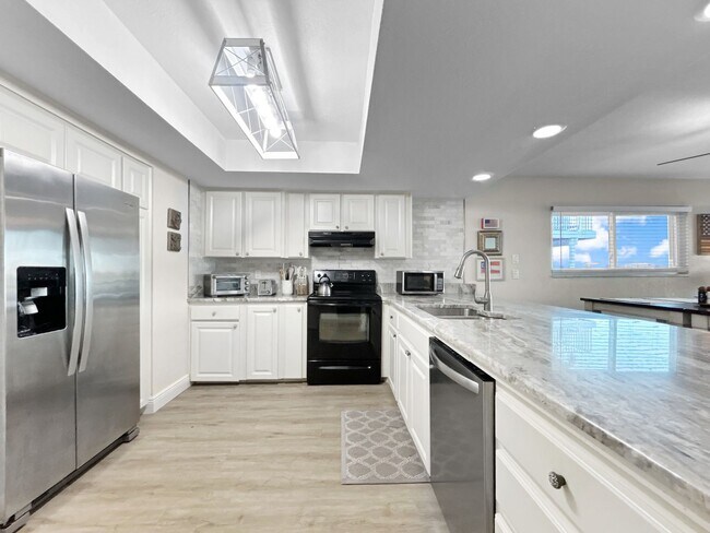 Building Photo - Waterfront Luxury Living – Fully Renovated...