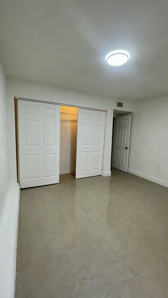 Second Bedroom Closet - 485 N Pine Island Rd