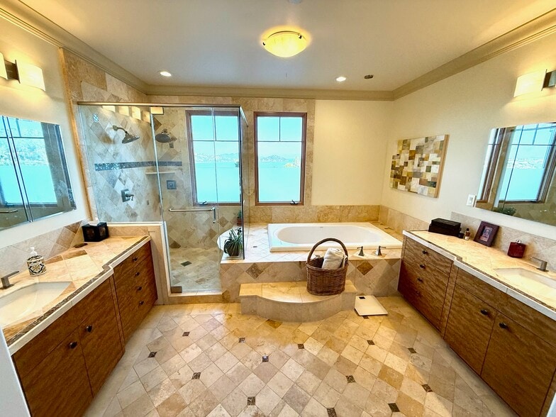 Primary suite:Bathroom features heated floors, towel warmer, and an auto-bidet for ultimate comfort - 115 Inez Pl