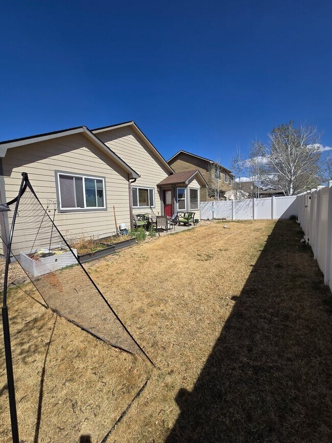 Building Photo - Spacious 5B/3B with Finished Basement Now Available!