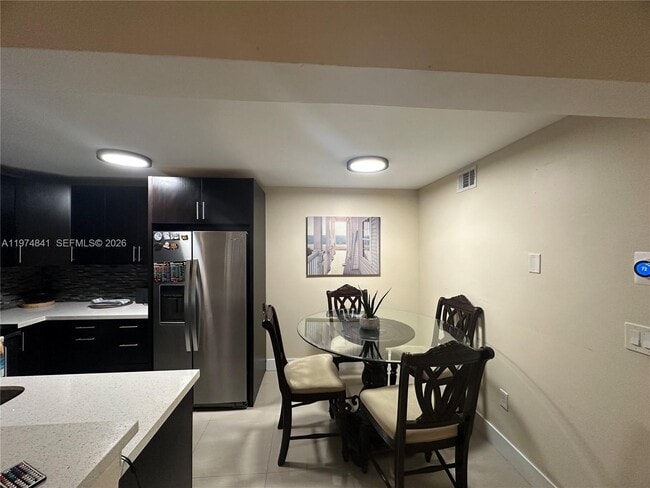 Building Photo - 9491 Palm Cir S