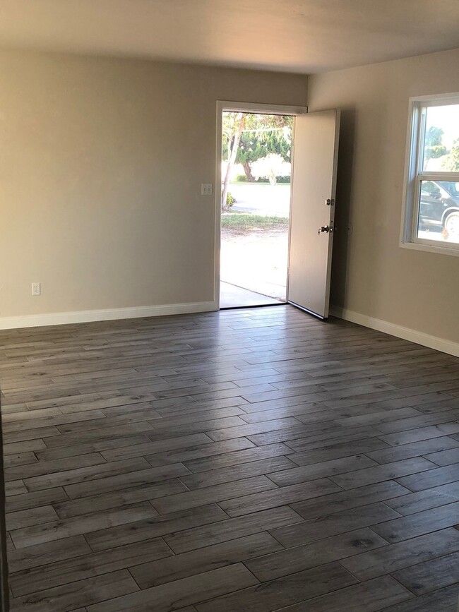 Building Photo - Live 3 Blocks Away From The Ocean!!
