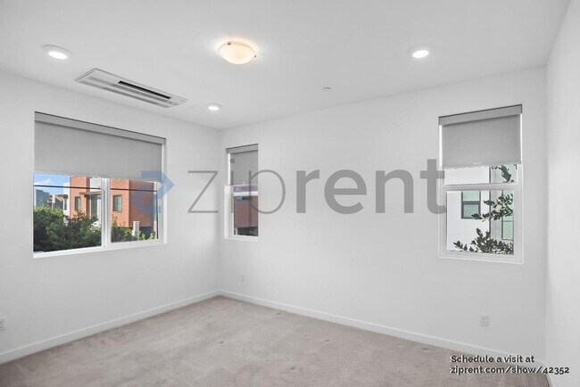 Building Photo - 5876 Cadence Ave