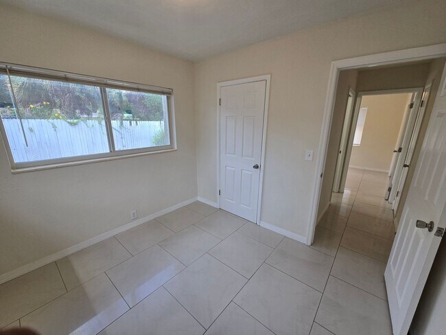 Building Photo - Updated East Delray Duplex | No HOA + Priv...