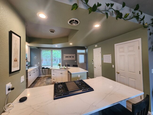 Building Photo - Stunning 3 Bedroom Townhome Tucked Away In...