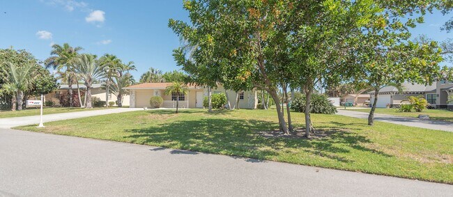 Building Photo - Indian Harbor Beach Stunner! Corner Lot Cl...