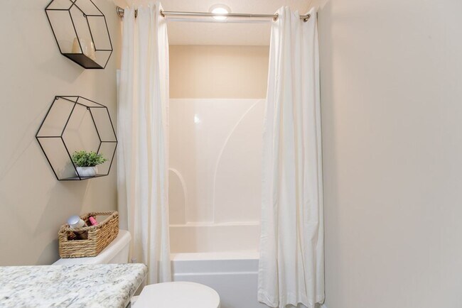 Building Photo - Contemporary 4BR/2BA Home with 2-Car Garage, Spacious Yard, and Close Proximity to Moody Air Forc...