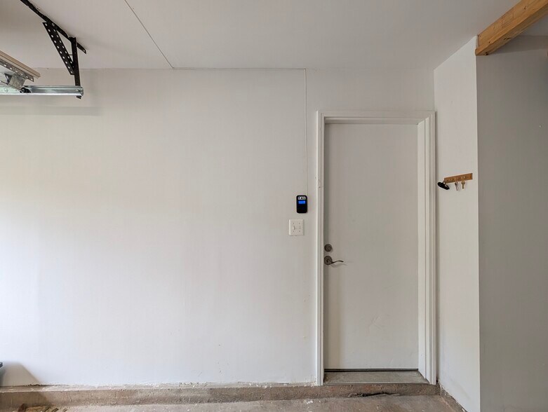 Garage interior - entry door - 14141 Betsy Ross Ln