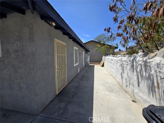 Building Photo - 16466 Arrow Blvd