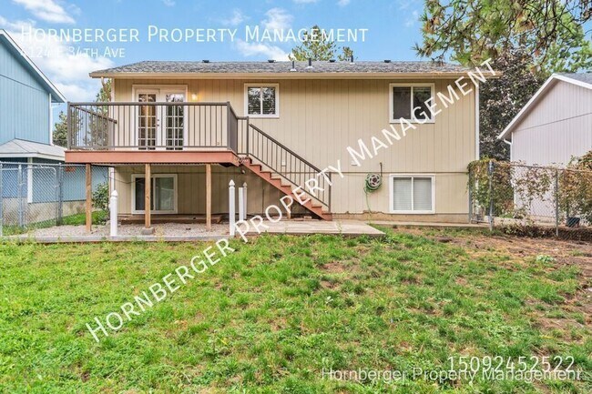 Building Photo - 4124 E 34th Ave