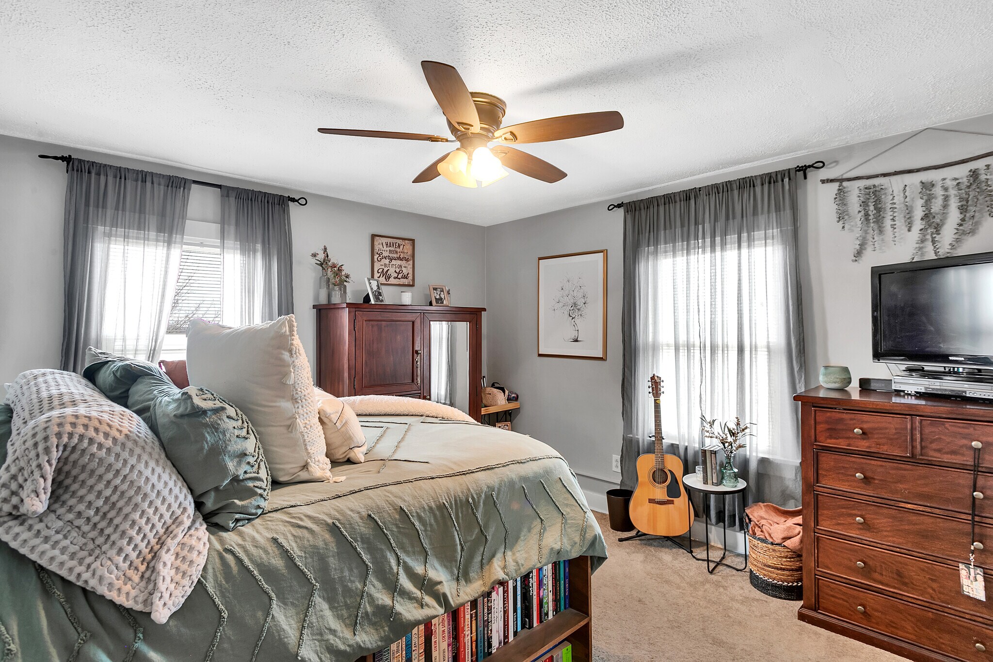 Generously sized primary bedroom with plenty of room for a full bedroom suite. - 203 Richbarn