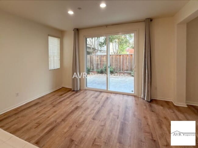 Building Photo - Spacious home with a large open concept kitchen, dining and living room
