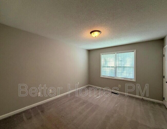 Building Photo - 5716 Woof Pl