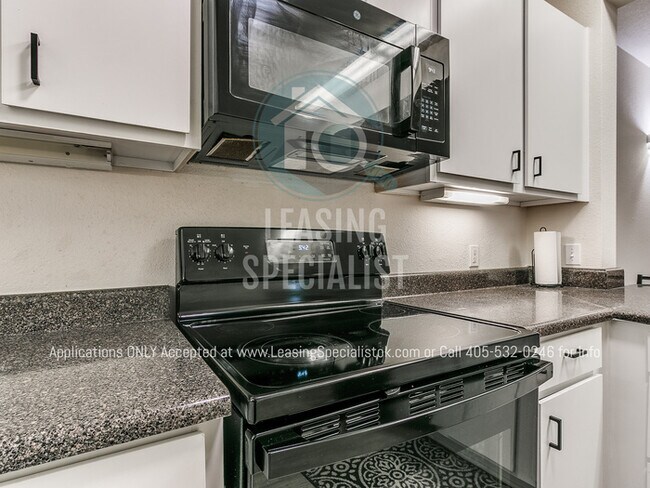 Building Photo - HALF OFF 1ST MONTHS RENT MOVE - IN SPECIAL...