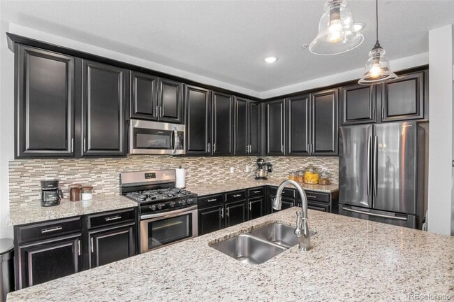 Building Photo - Gorgeous ground level Condo with Detached Garage | Pets Welcome | Detached Garage Included