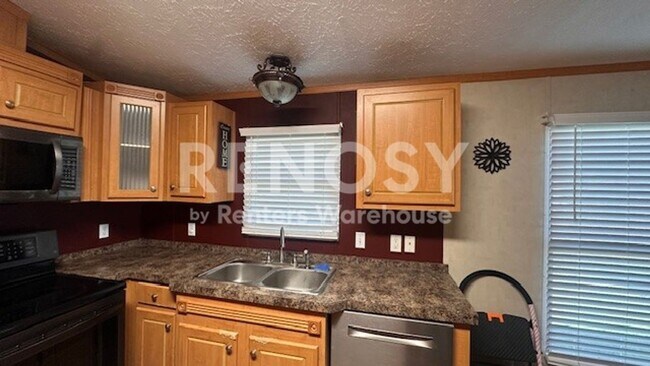 Building Photo - 6425 Mirage Dr