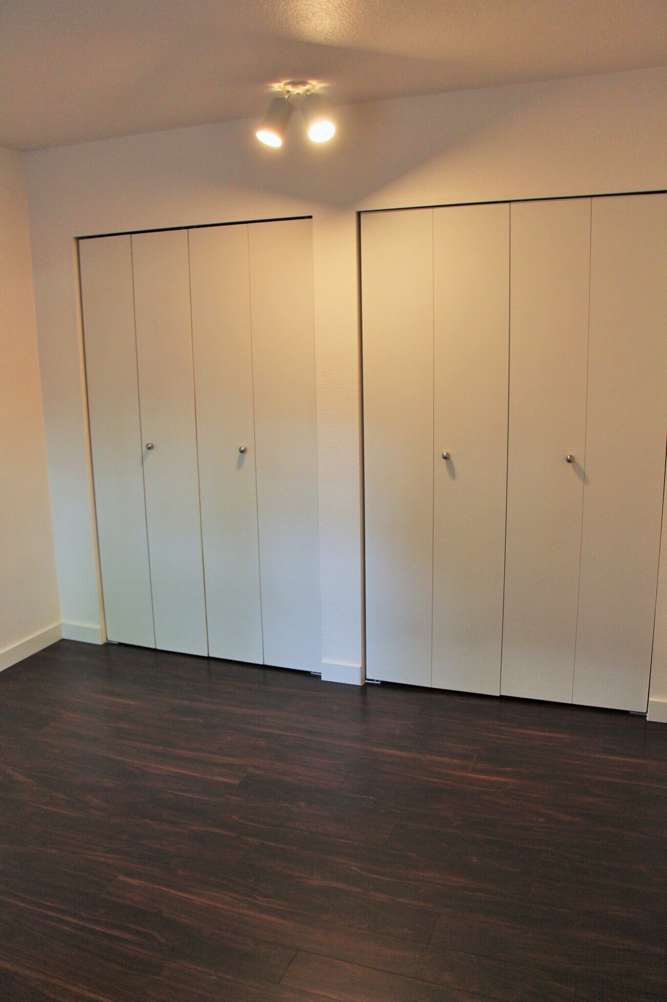 Second bedroom includes two large closets. - 10418 Northeast 32nd Place