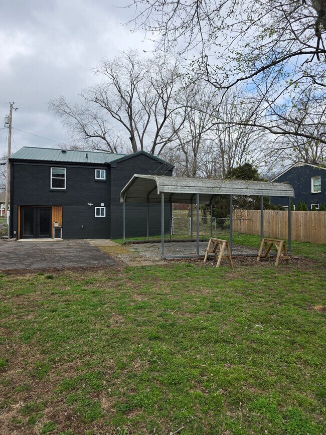 Building Photo - Charming 2BR with Walk-Out Basement, Fenced Yard & Flexible Murphy-Bed Office