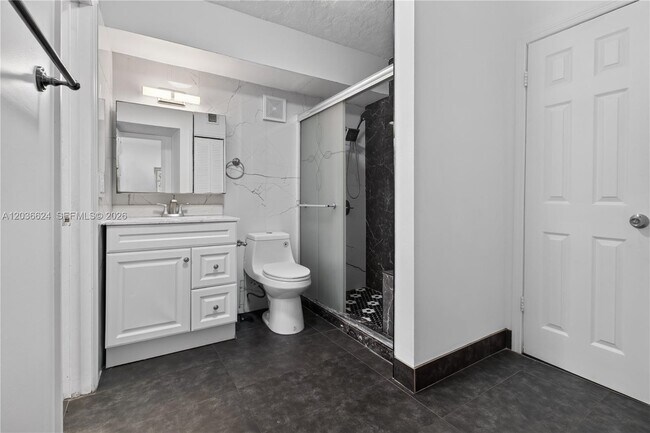 Building Photo - 6070 W 18th Ave