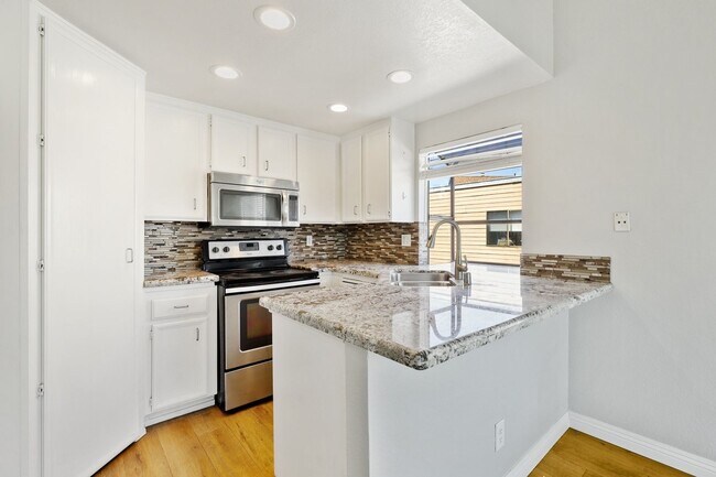 Building Photo - Top-Floor Condo in UTC – Updated and Move-...